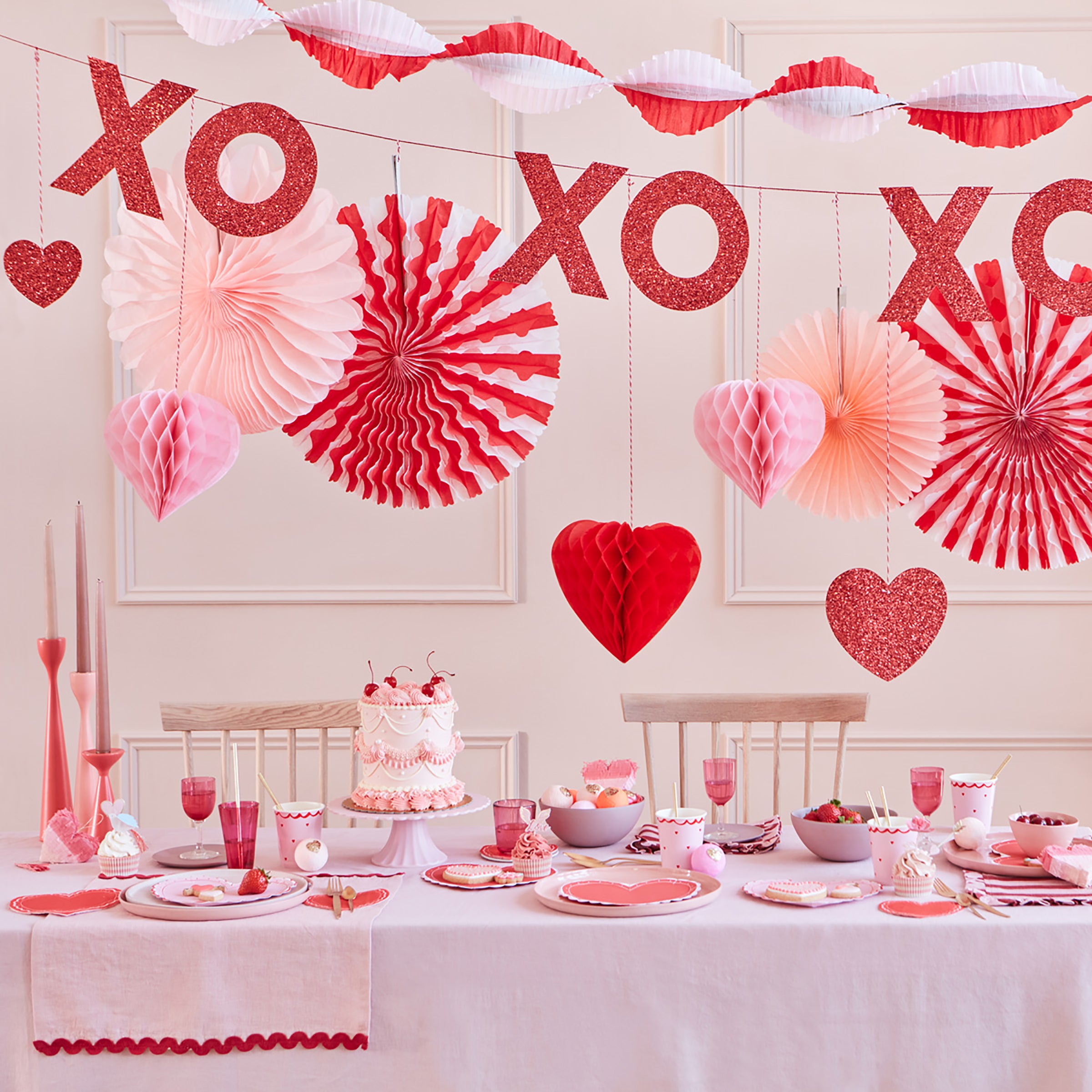 Our party streamer is crafted from pink, red and gold paper perfect for Valentine's Day party decorations.