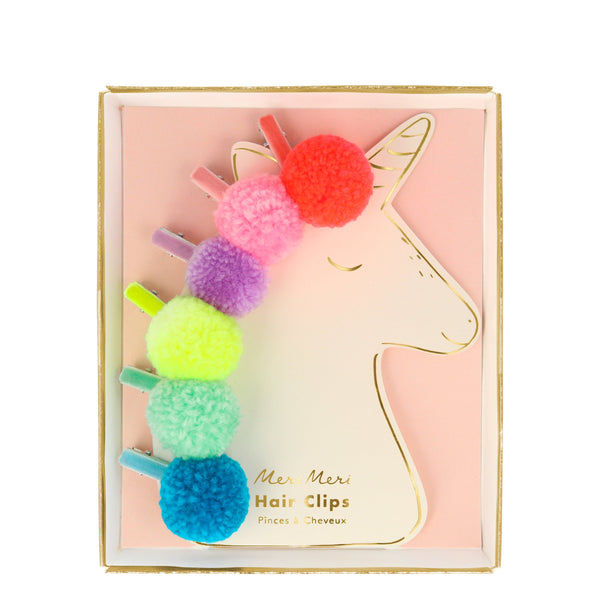 Our pompom hair clips are presented on a unicorn shaped card, the perfect gift for a unicorn themed party.
