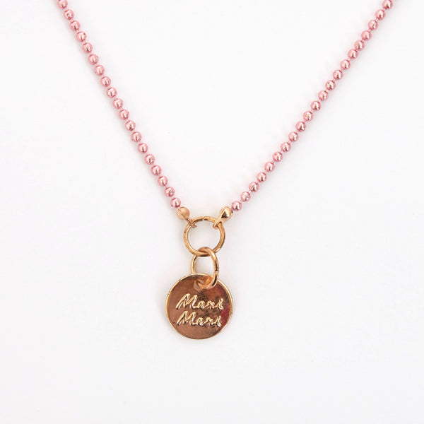 This pretty necklace features a padded felt bunny, sitting in a glittery pink leatherette pocket, with a pink bead chain. Image4