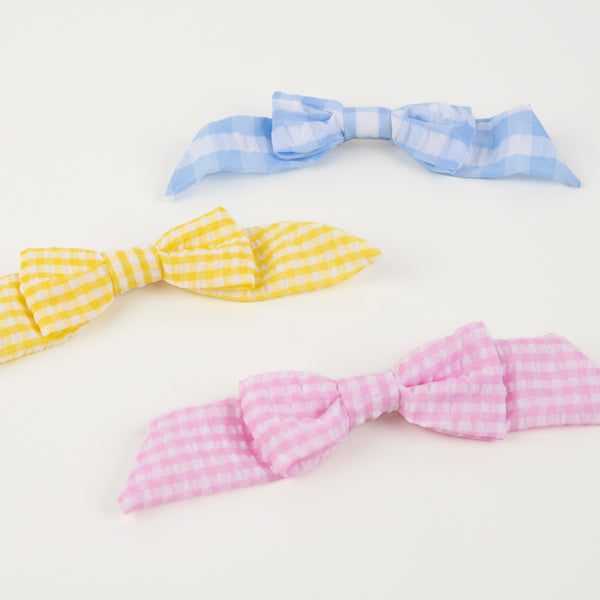 Our stylish kids gold hair clips, with gingham bows, make wonderful kids hair accessories. Image4