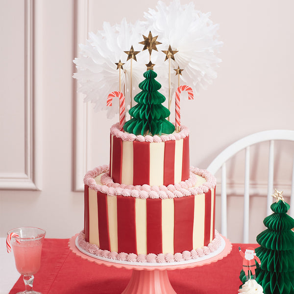 Our Christmas cake decorations include gold glitter star cake toppers and a honeycomb 3D Christmas tree. Image2