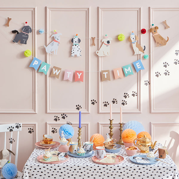 This adorable paper garland, featuring dogs, is perfect for a dog's birthday party or a dog themed party. Image2
