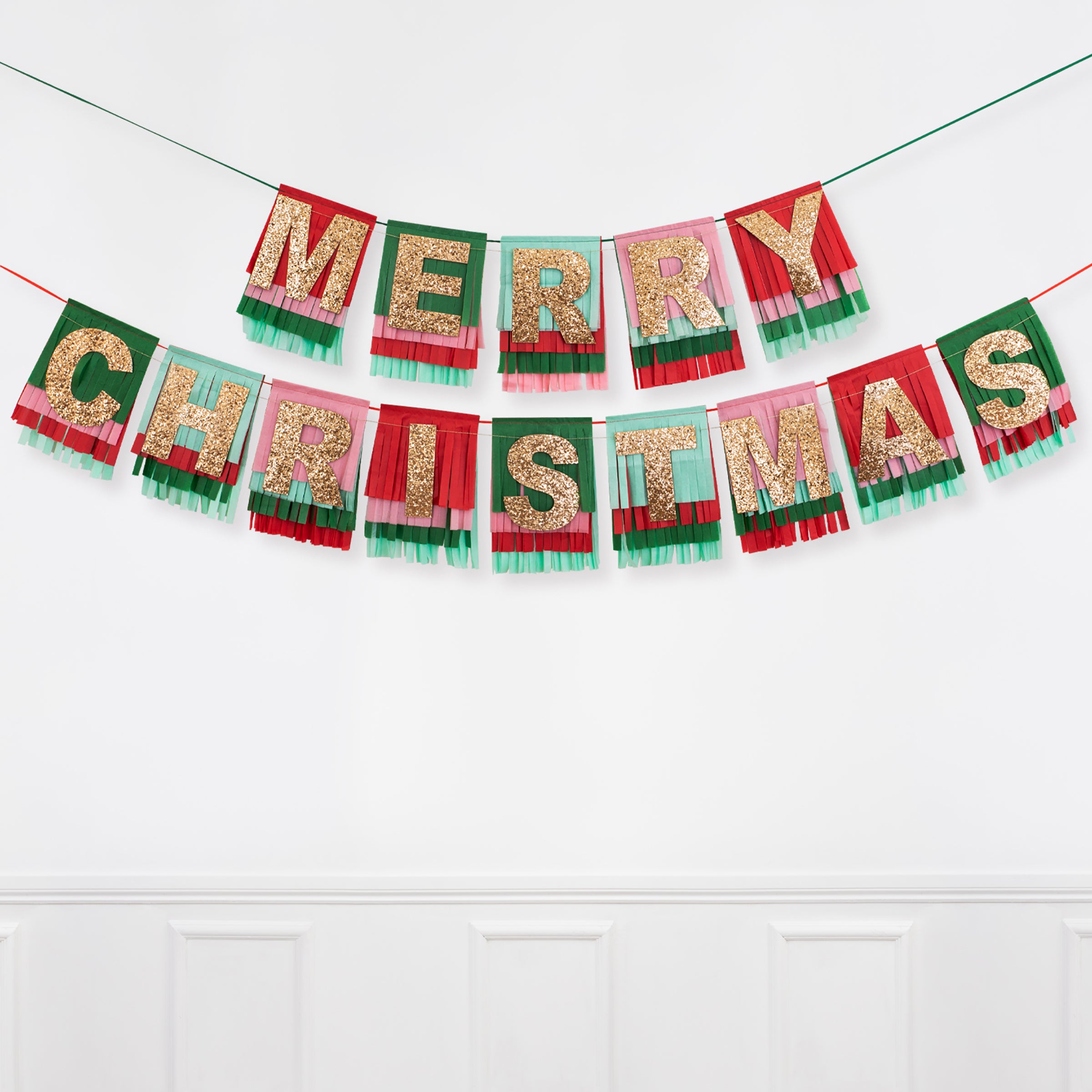 This glittery garland, in Christmas colours, is a fabulous Christmas hanging decoration.