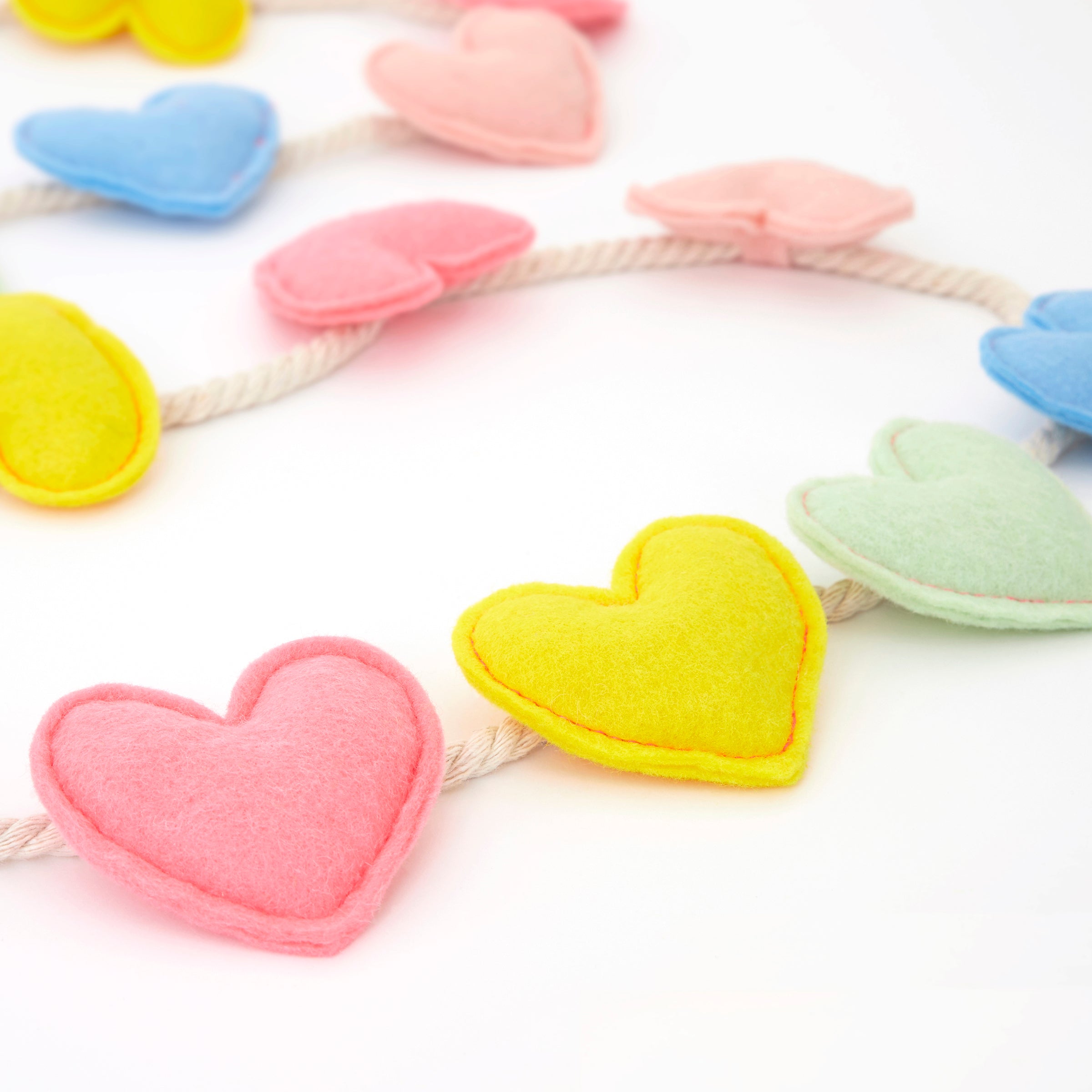 Our felt garland, featuring colourful hearts, is the perfect anniversary decoration or Valentine's Day decoration.