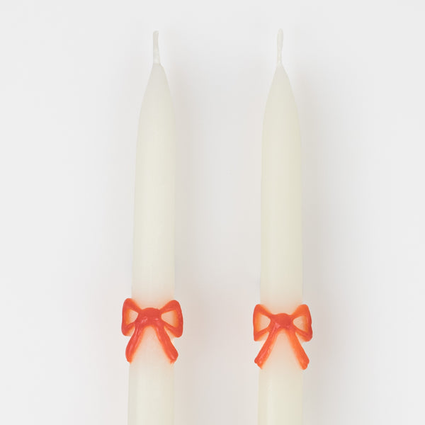 Our taper candles, with a bow design, are perfect as Christmas decorative candles. Image5