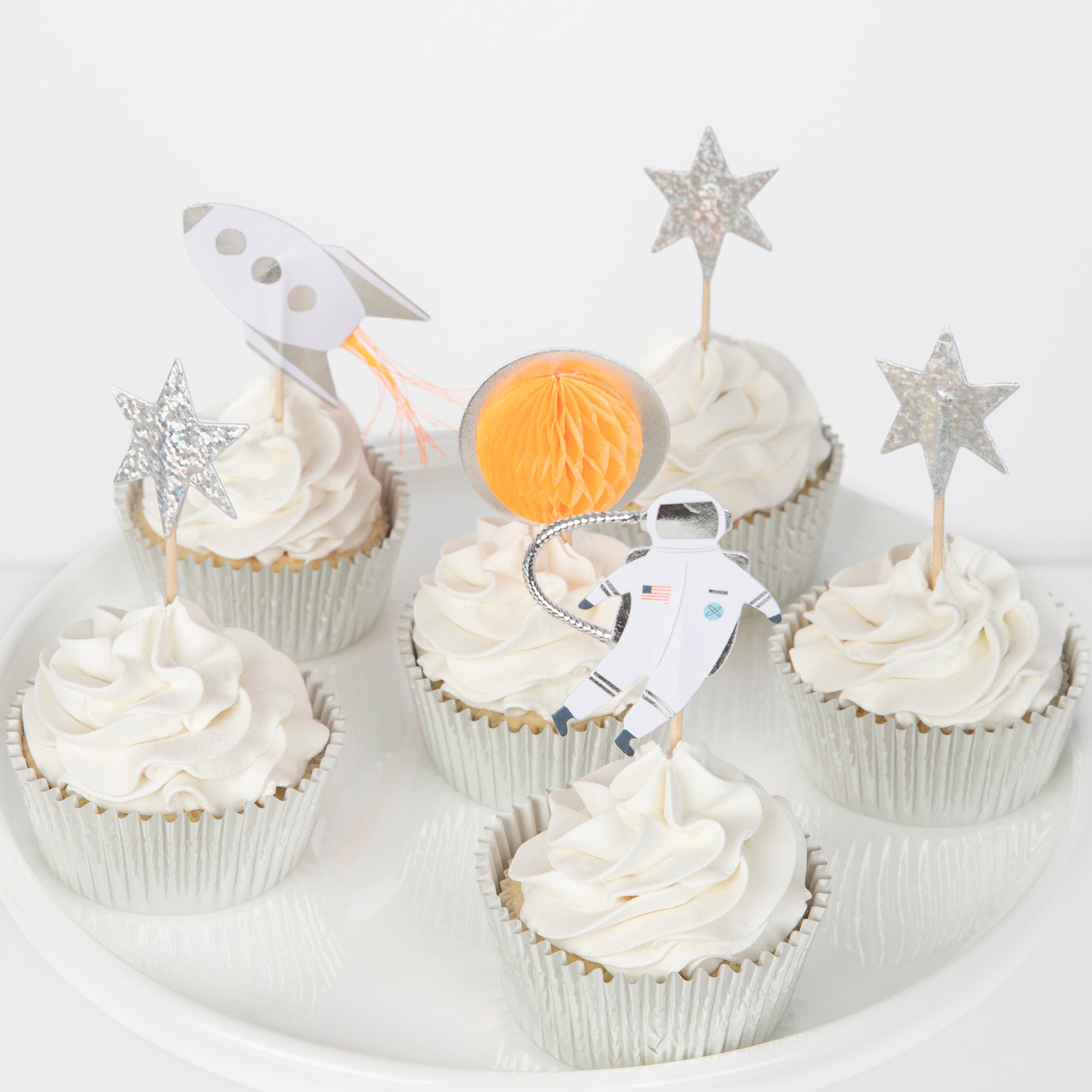 This special cupcake set features 24 cake toppers and 24 cupcake cases perfect for a space party.