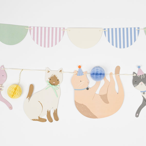 A cat themed birthday party will look amazing with our paper garland featuring cute cat decorations. Image2