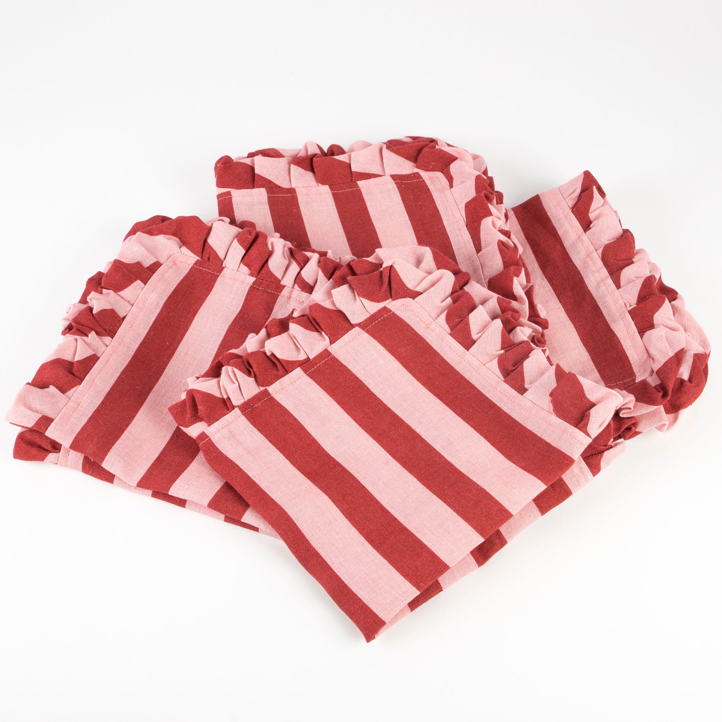 Our fabric napkins in festive red and pink are wonderful Christmas tableware.