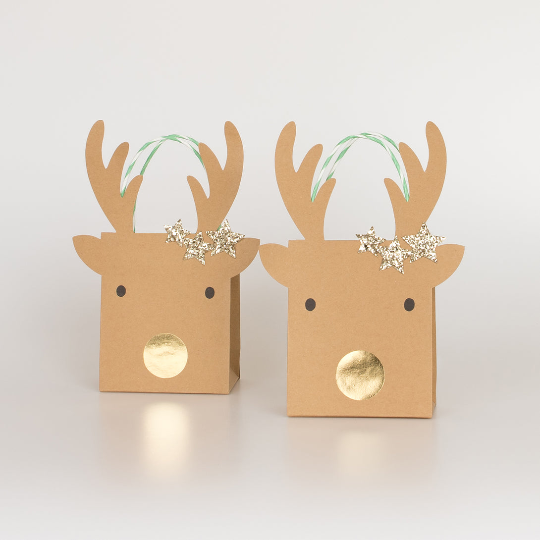 Our Christmas bags for gifts, with reindeer and stars, make luxury paper bags.