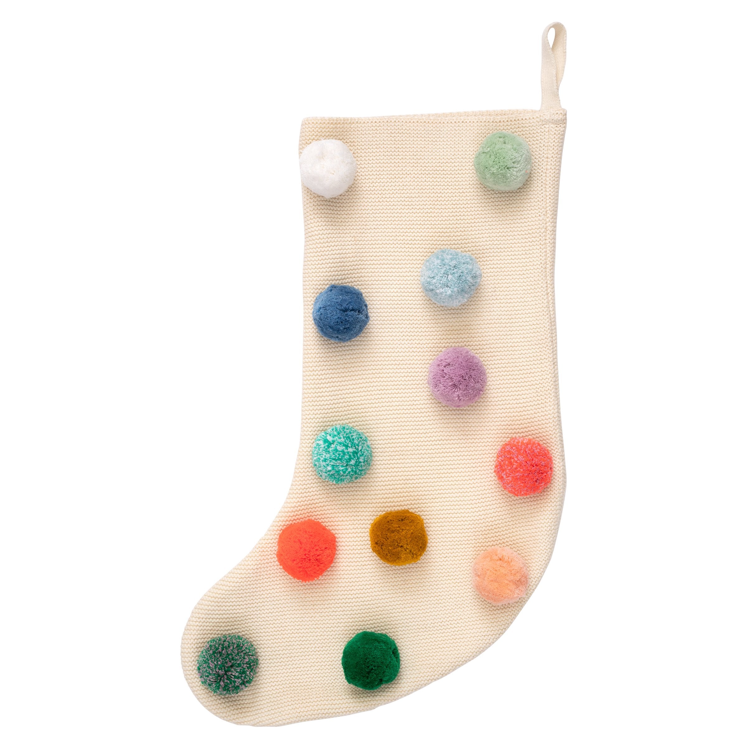 Colourful pompoms make this a fabulous fun kids' Christmas stocking.