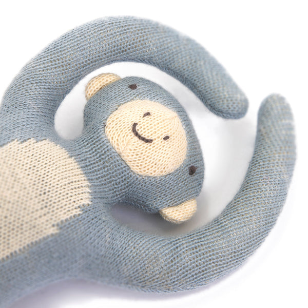 This monkey baby rattle is crafted from organic cotton, perfect as a newborn baby gift. Image2