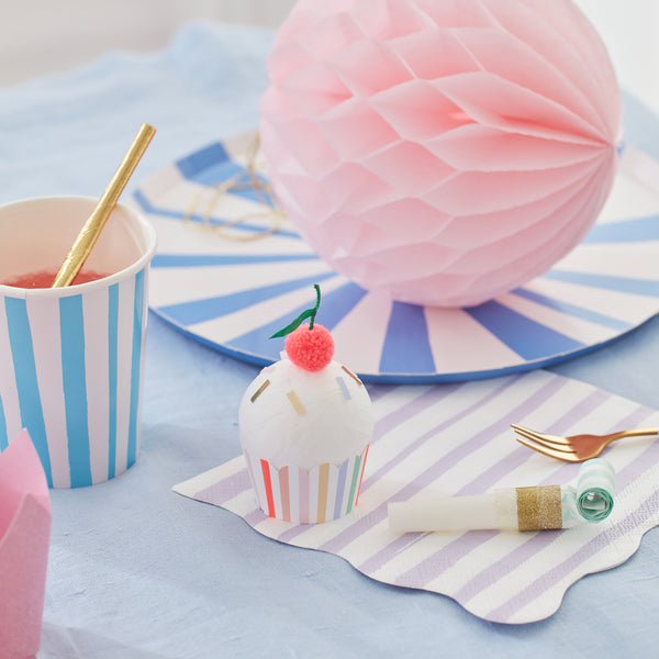 This party favours are cleverly crafted to look like cupcakes, and contain temporary tattoos for kids and friendship bracelets. Image2