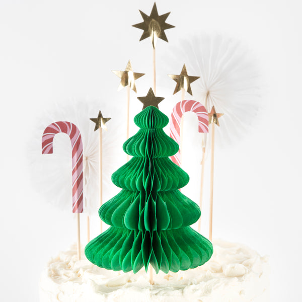 Our Christmas cake decorations include gold glitter star cake toppers and a honeycomb 3D Christmas tree. Image4