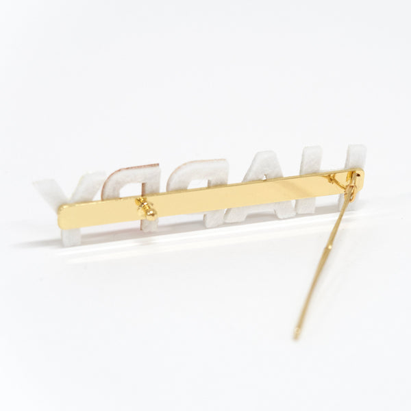 Our gold hair clip features the word "Happy" in leatherette and glitter lettering. Image4