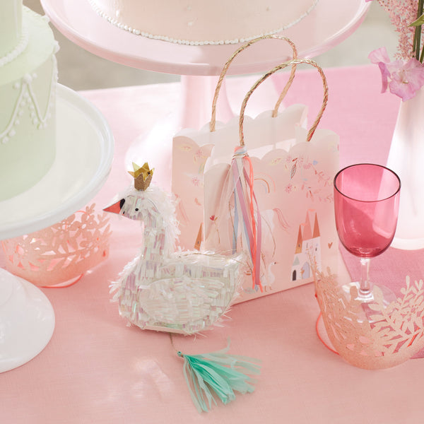 These beautiful party bags feature unicorns, swans and castles, with a scalloped edge and gold foil detail. Image5